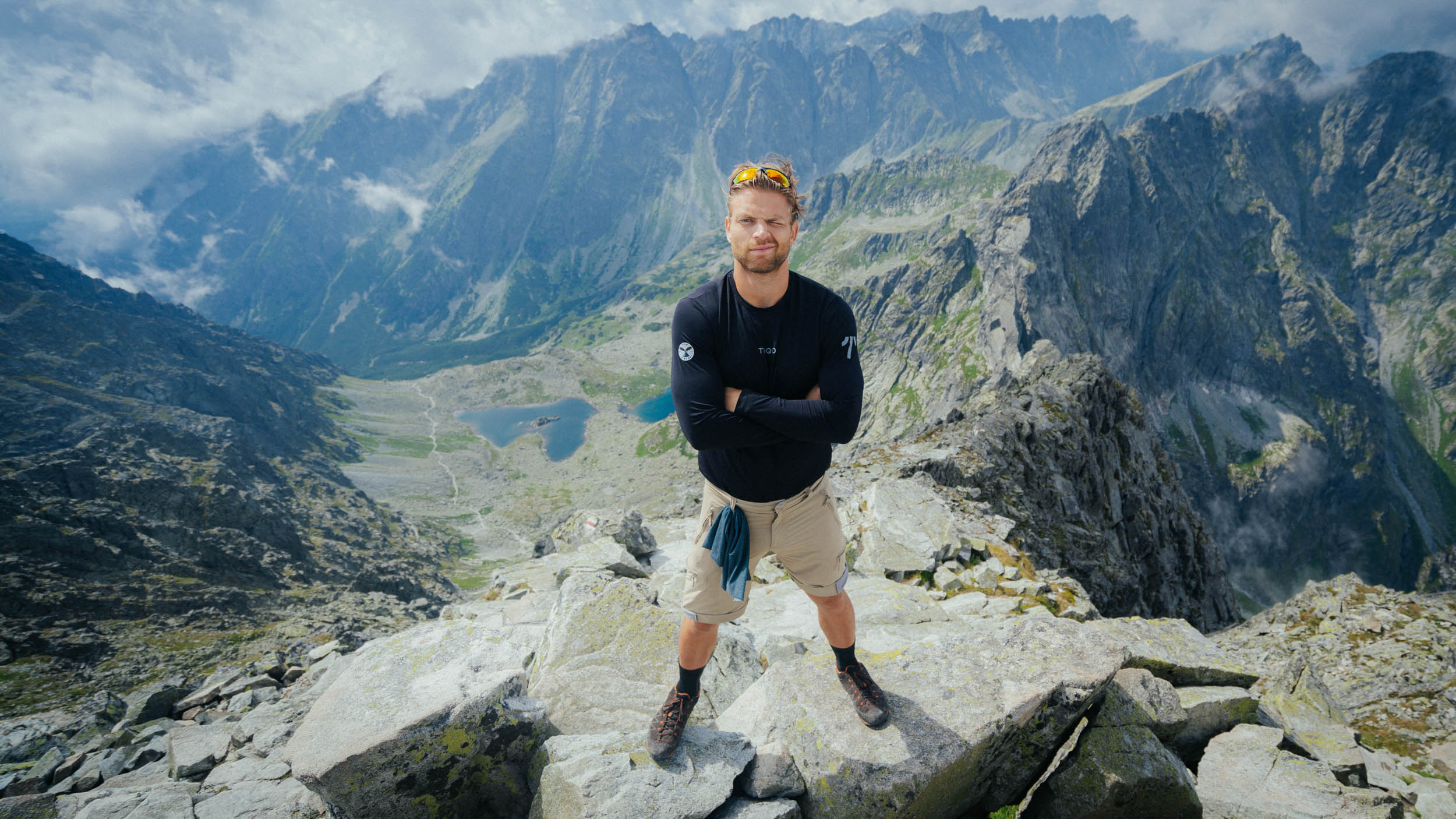 A man standing in the mountains