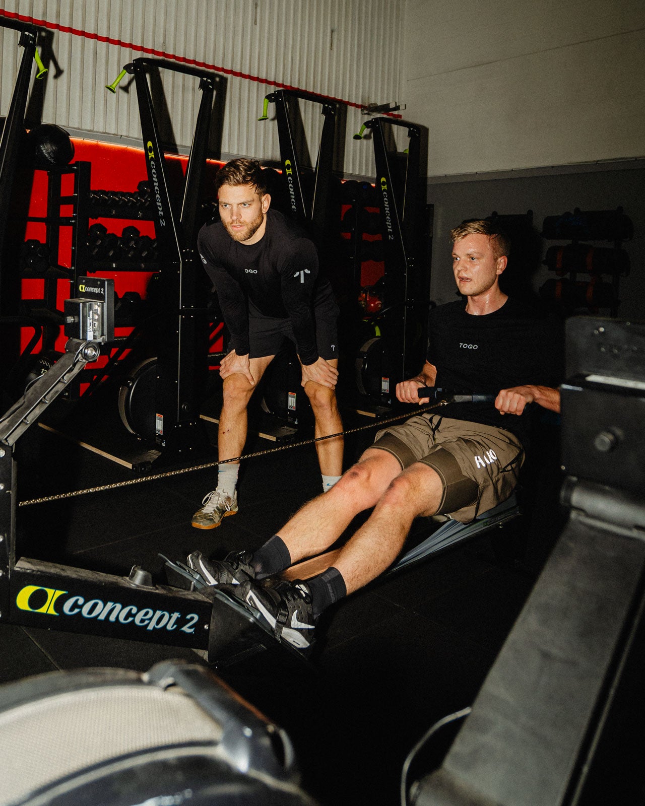 Two men working out in a gym