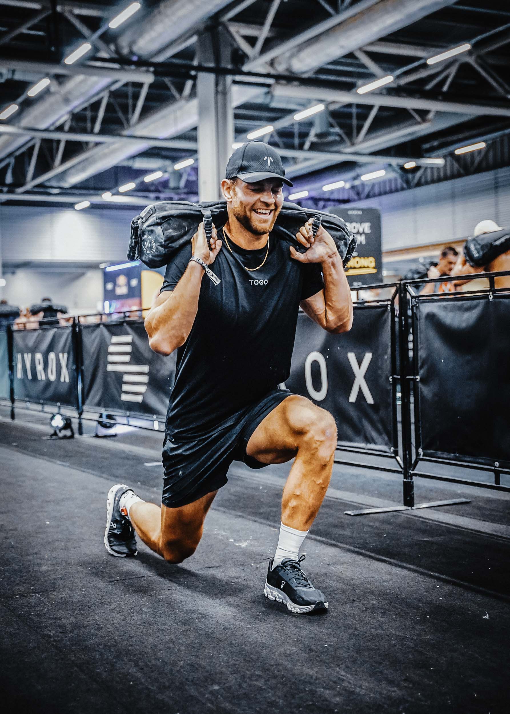 A man doing a hyrox in TOQO clothing