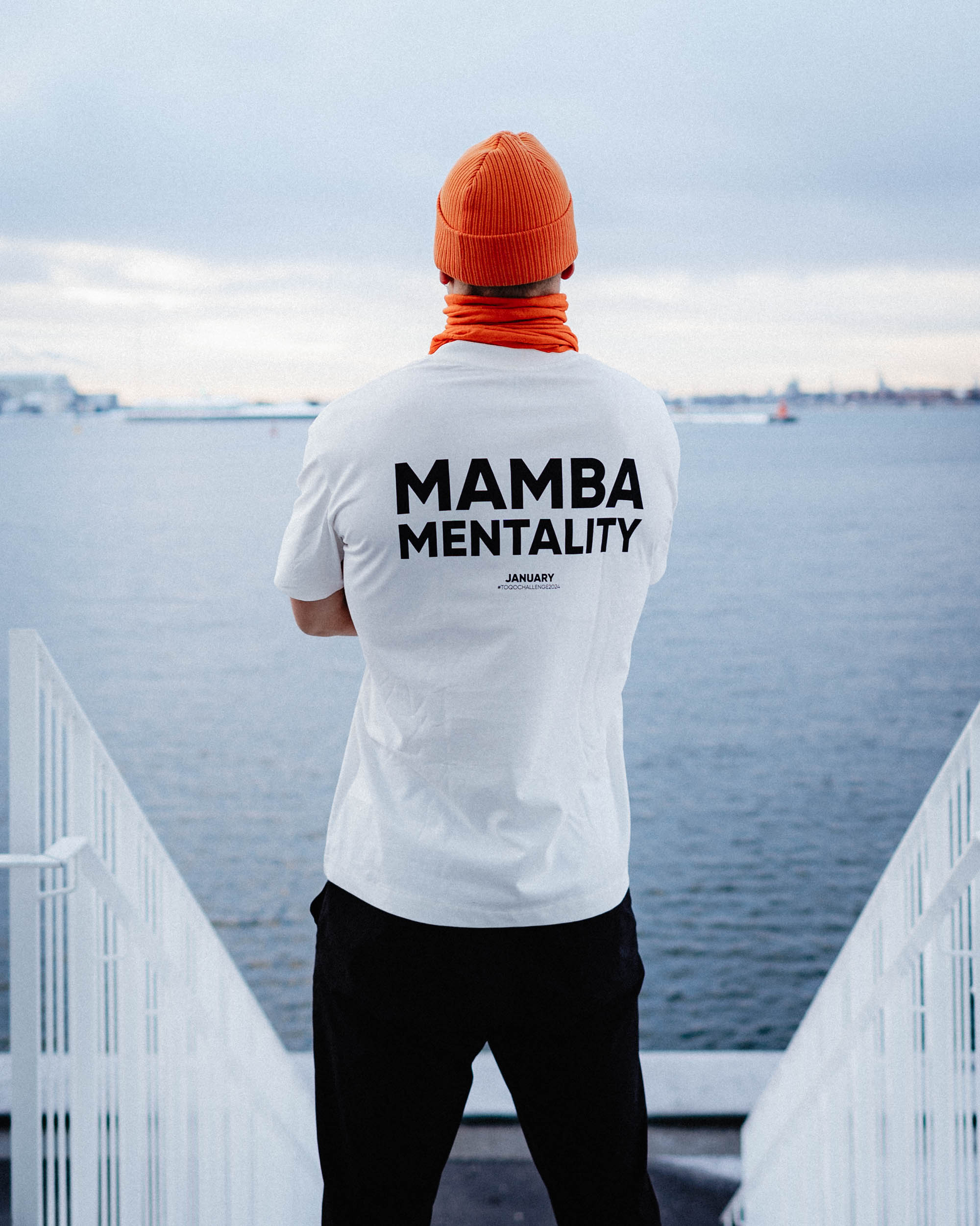 A man standing in a TOQO boxy tee