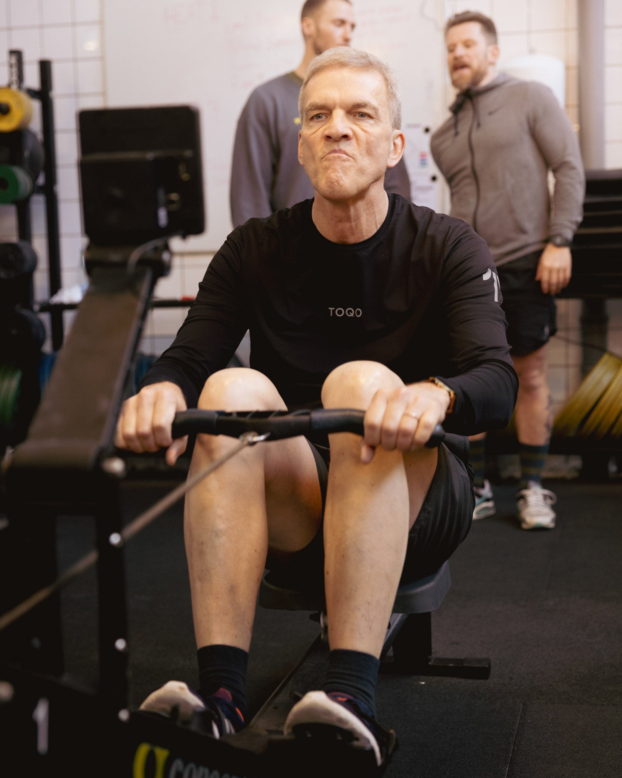 A man rowing in TOQO clothes