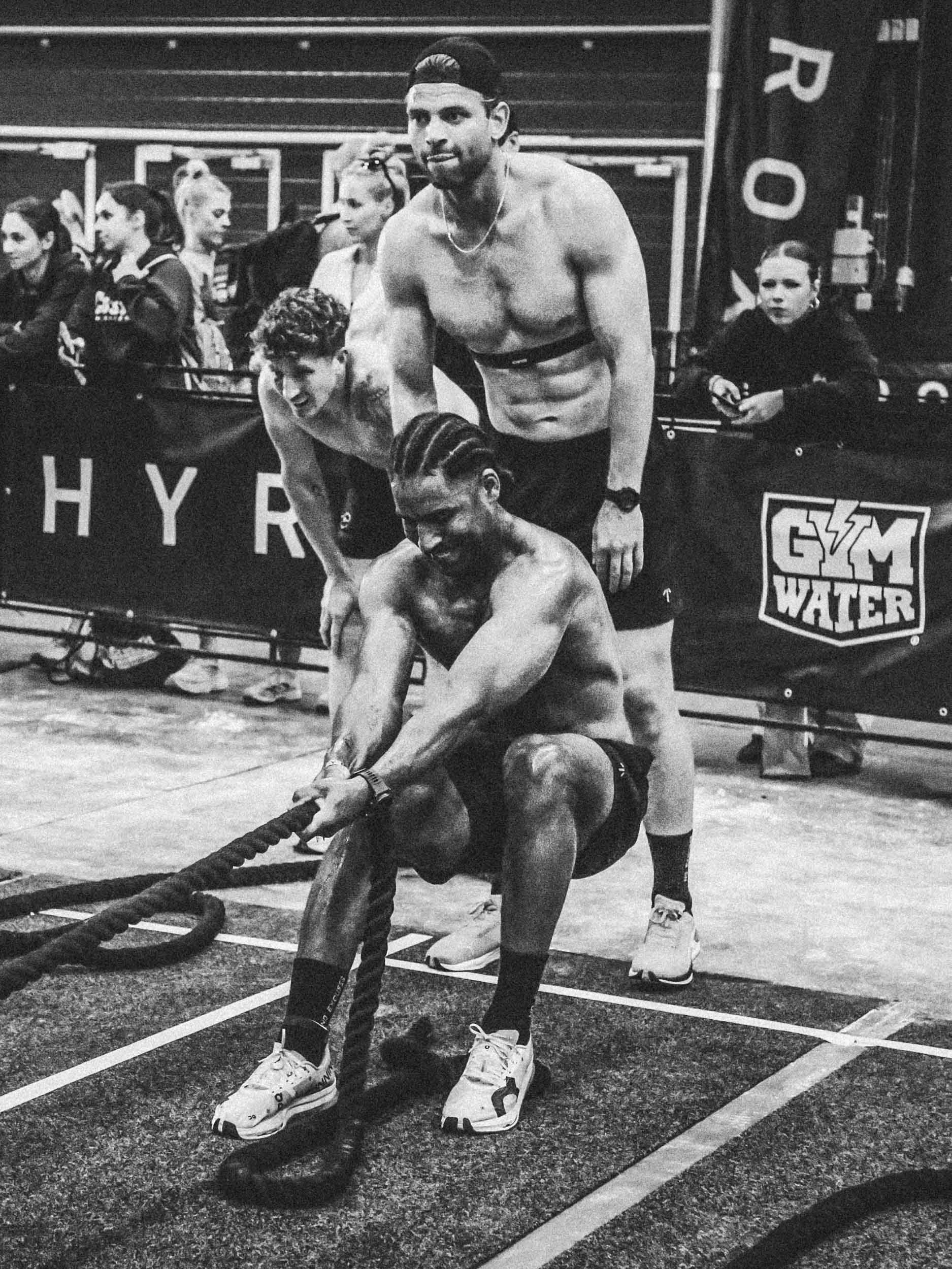 Two men during a Hyrox in TOQO shorts