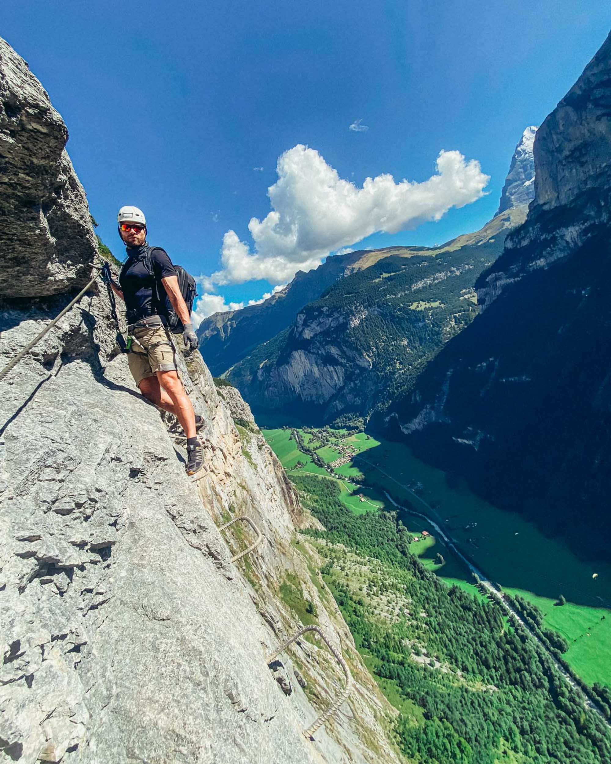 A man climbing in the mountains