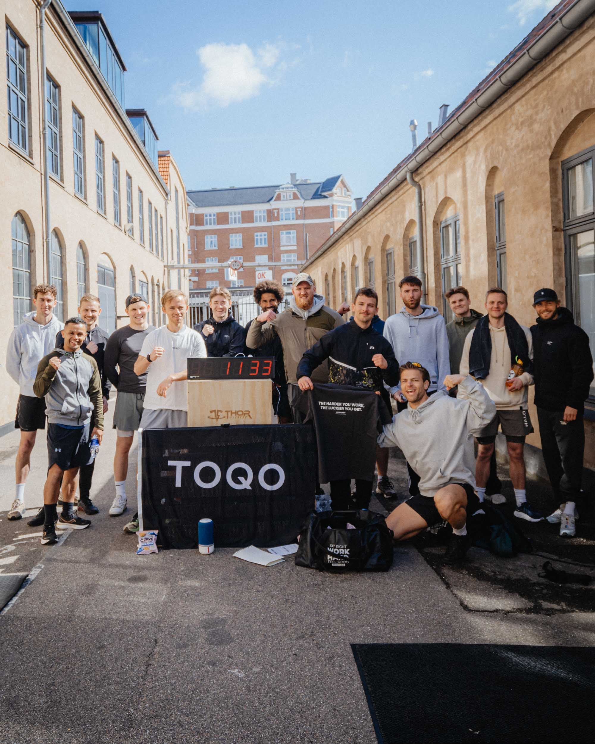 A group of men doing push ups